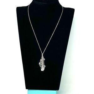 Authentic Tiffany & co. Booklet Taxi Yellow Cab Pendant Necklace.